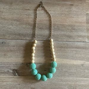 Mint green knitted and wood bead necklace